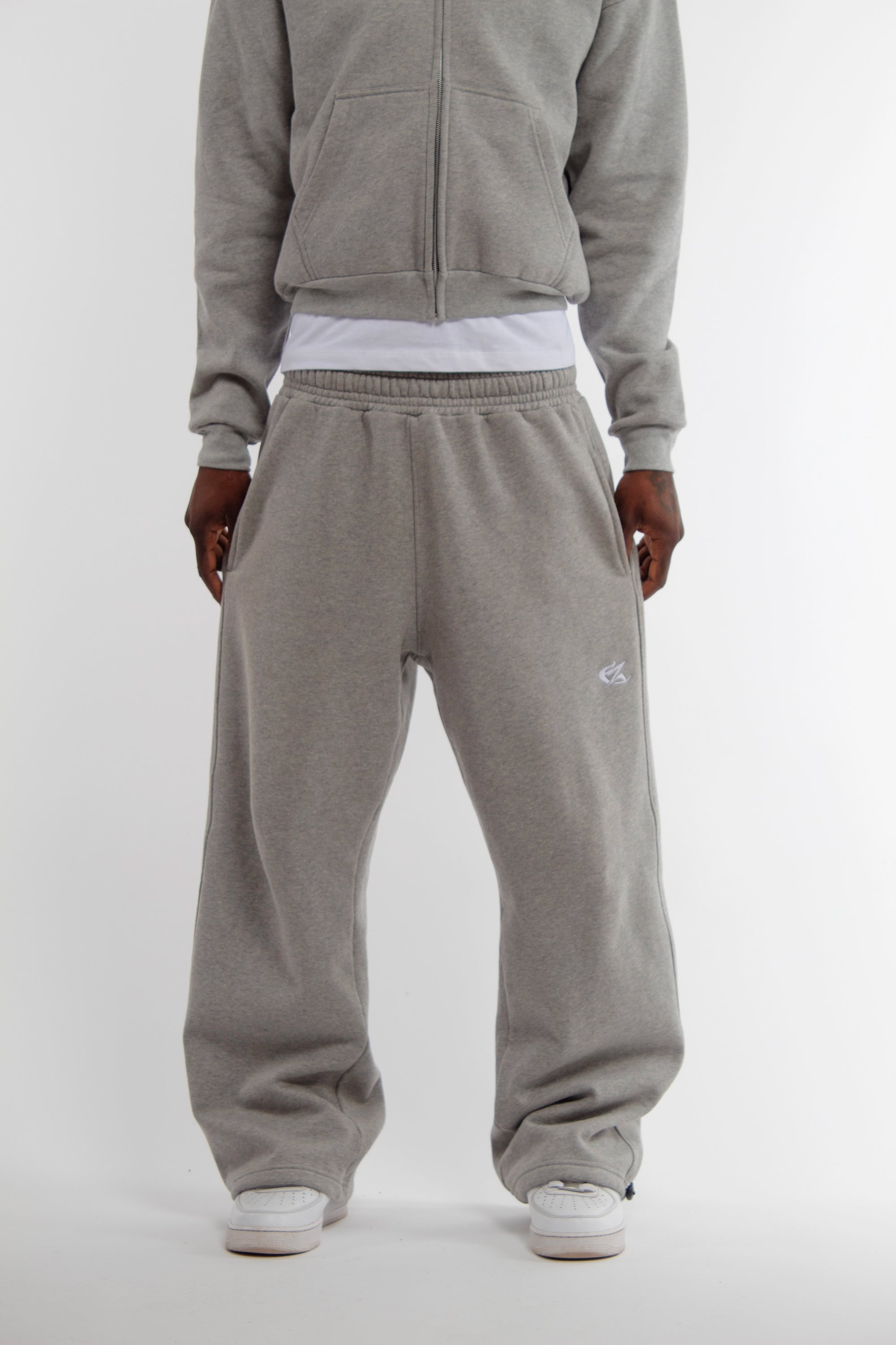 Front view of Cynique Basic Gray Jogger — oversized fit sweatpants in soft cotton with elastic waistband and embroidered logo with 'joggers' call-to-action text overlay