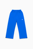 Flat lay of Cynique Basic Blue Jogger — oversized 100% cotton streetwear sweatpants with elastic waistband, adjustable cuffs, and embroidered logo