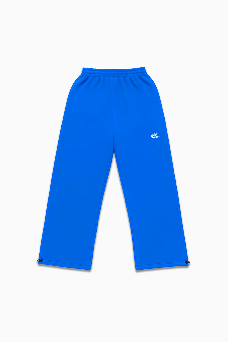 Flat lay of Cynique Basic Blue Jogger — oversized 100% cotton streetwear sweatpants with elastic waistband, adjustable cuffs, and embroidered logo
