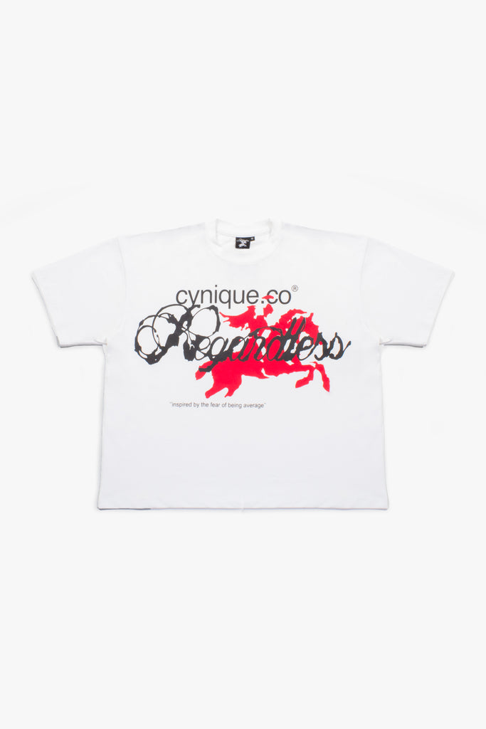 Flat lay of Cynique Regardless Tee in white — oversized cotton T-shirt with bold ‘Regardless’ graphic, red horse silhouette, and ‘fear of being average’ quote